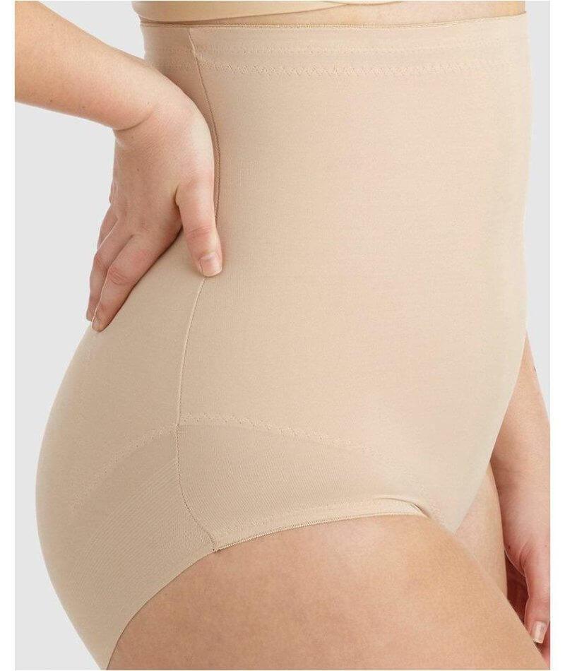 Extra firm control girdle and a longline bra. Helps everything fit